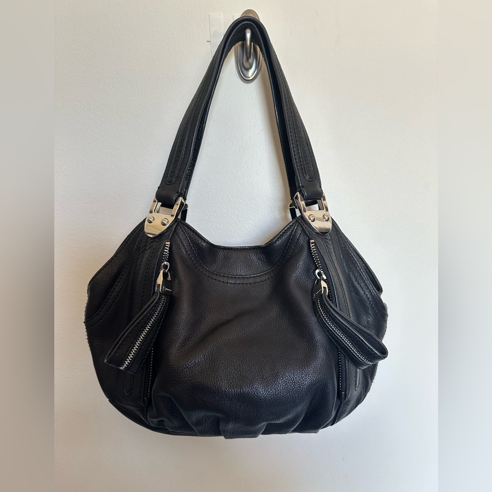 B Makowsky biker black leather bag with silver hardware and zipper detail